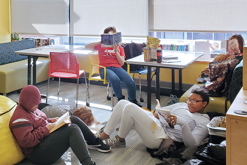 The Silent Book Club at Newport (R.I.) Public Library offers teens a space for quiet reading after school. Photo: Newport (R.I.) Public Library