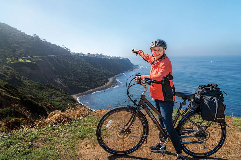 Monique Sugimoto, librarian and archivist for Palos Verdes Library District's Local History Center, points out over the coast. Photo: Erik Jay