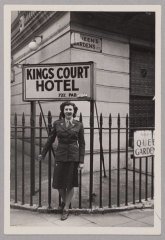 Woman (Sylvia) in front of the Kings Court Hotel, London, England; August 1946 