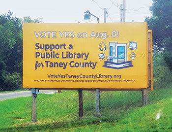 Billboard that reads Vote Yes on Aug. 8! Support a Public Library for Taney County VoteYesTaneyCountyLibrary.org